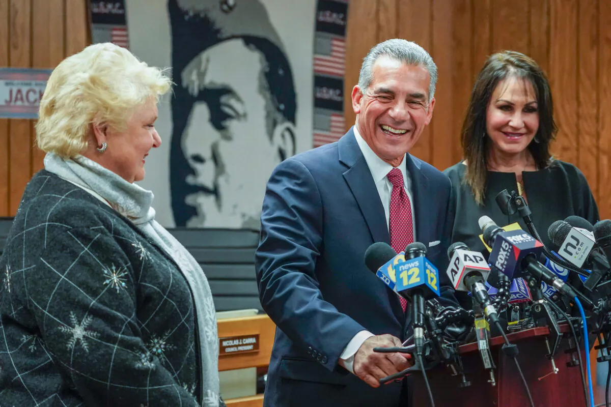 Republican gubernatorial candidate Jack Ciattarelli, center, is joined by his wife Melinda, right, and candidate for Lt. Gov. Diane Allen as he speaks during a news conference, in Raritan, N.J., on Friday, Nov. 12, 2021. (Mary Altaffer/ AP Photo)