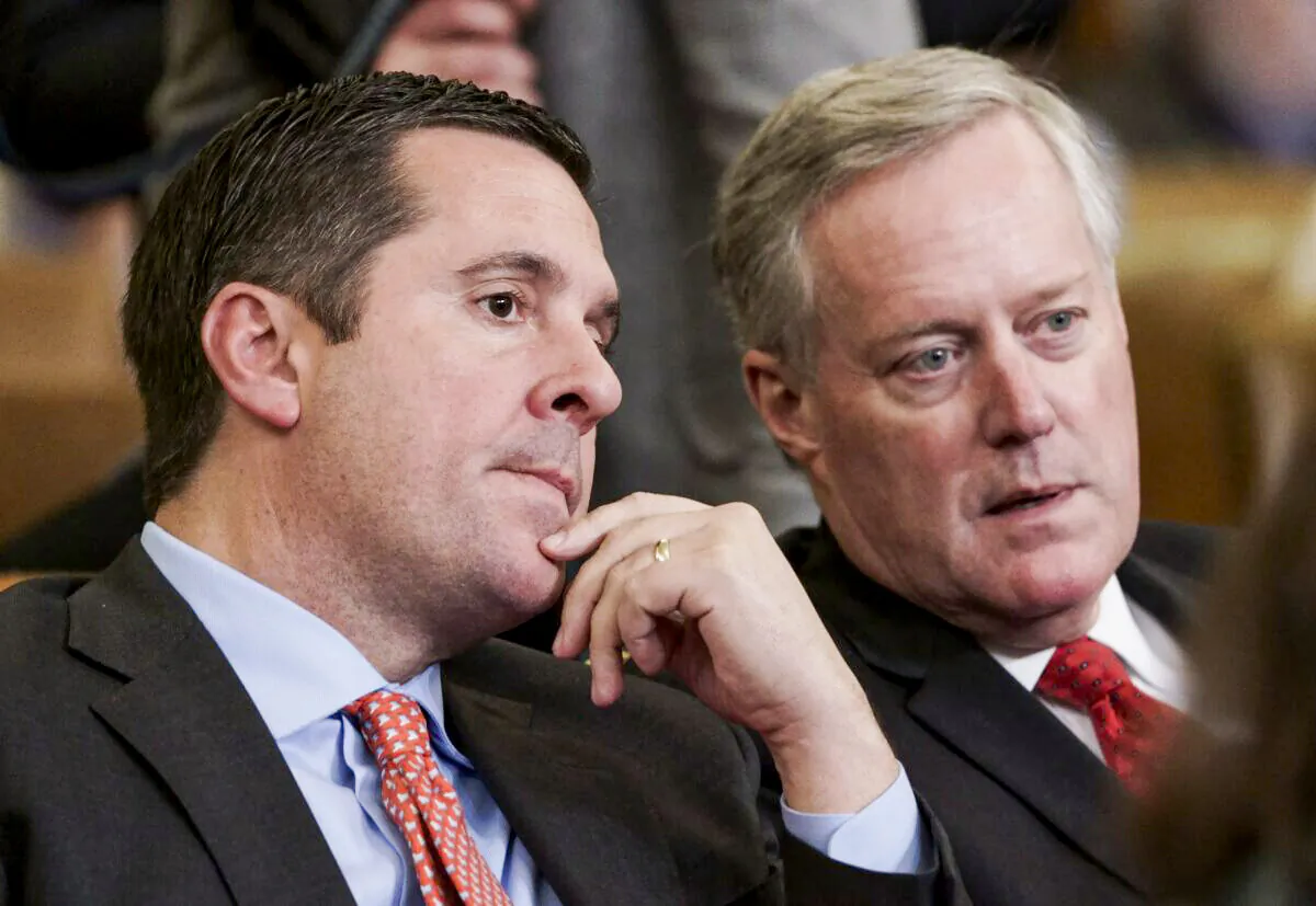 Rep. Devin Nunes, R-Calif, left, the ranking member of the House Intelligence Committee, speaks with then Rep. Mark Meadows, R-N.C., a member of the House Committee on Oversight and Reform,  on Capitol Hill in Wash., on Dec. 2019. (J. Scott Applewhite/AP Photo)