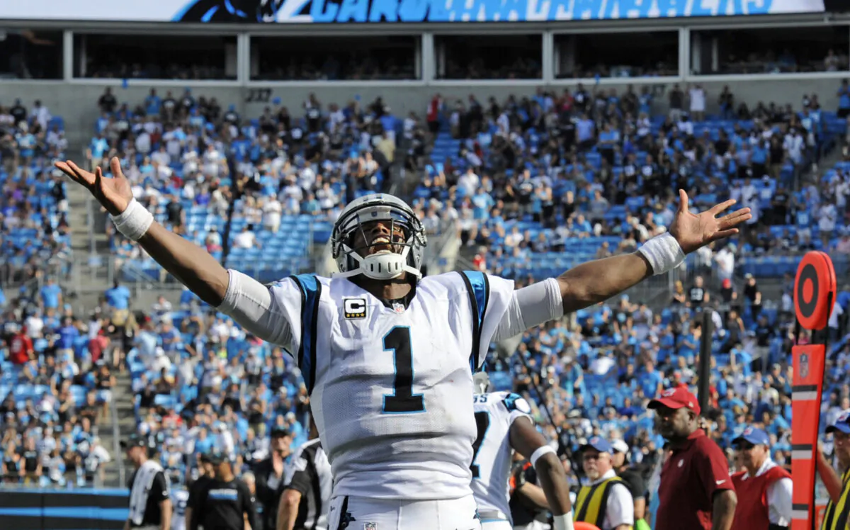 Carolina Panthers' Cam Newton (1) celebrates a touchdown against the San Francisco 49ers in the second half of an NFL football game in Charlotte, N.C., on Sept. 18, 2016. (Mike McCarn/AP Photo)