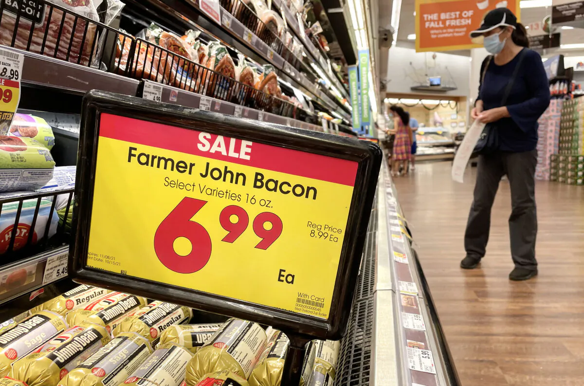 A person shops in the meat section of a grocery store in Los Angeles, Calif., on Nov. 11, 2021. (Mario Tama/Getty Images)