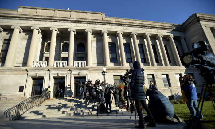 Reporters are seen outside the Kenosha County Courthouse in Kenosha, Wis., on Nov. 2, 2021. (Sean Krajacic/Pool/Getty Images)