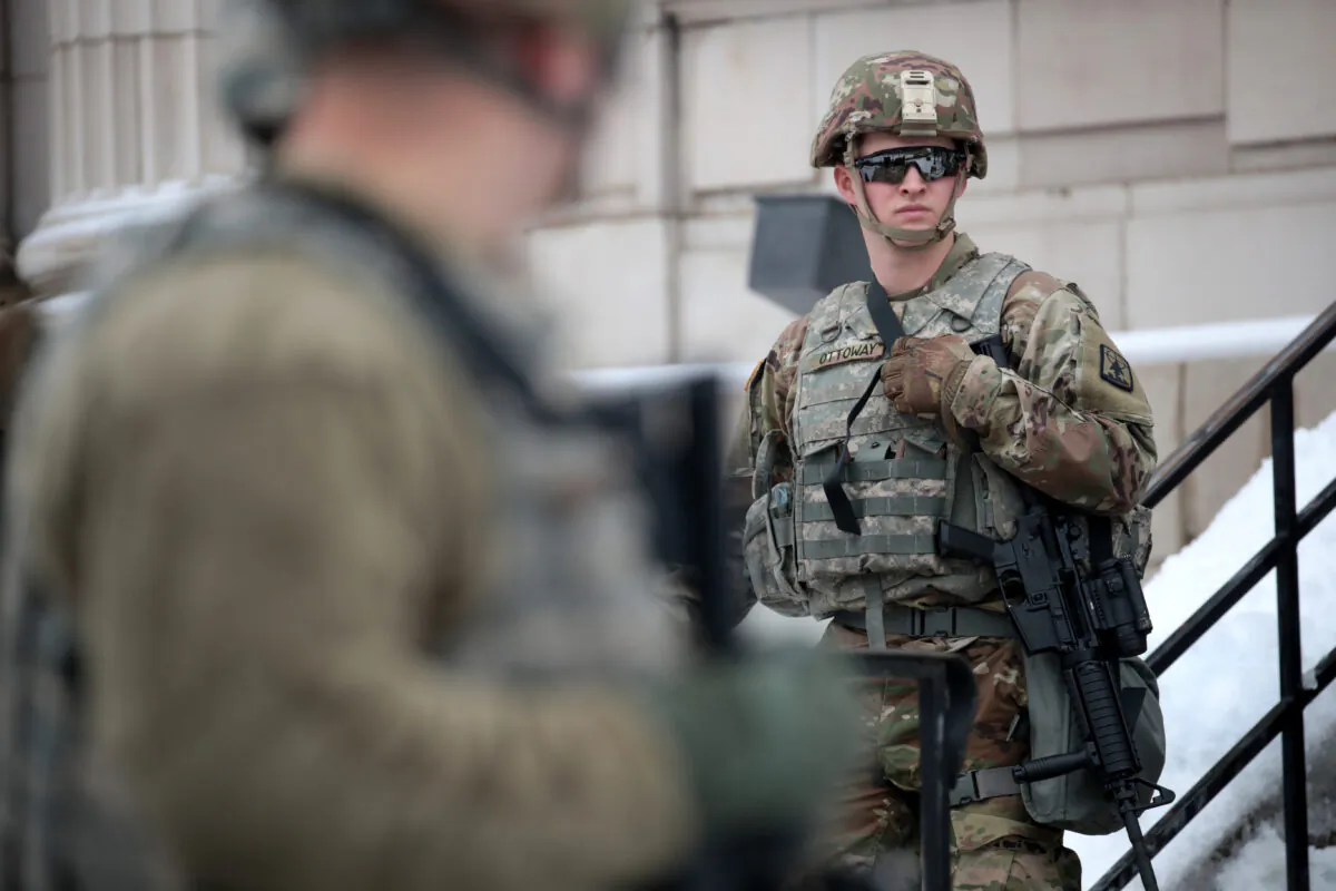 National Guardsmen stand guard near the Kenosha County Courthouse in Kenosha, Wis., on Jan. 5, 2021. (Scott Olson/Getty Images)