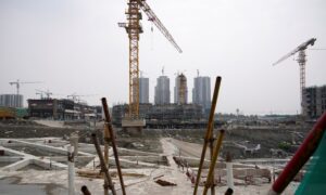 Beijing Expands Real Estate Investment Trusts to Reduce Local Government Debt Risk