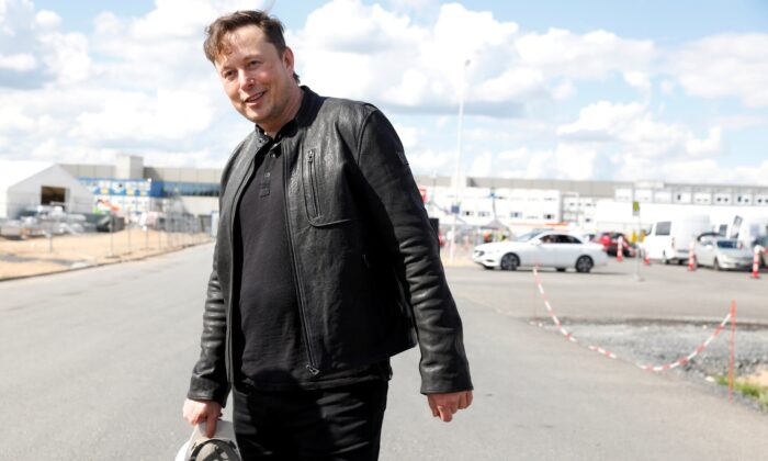 SpaceX founder and Tesla CEO Elon Musk looks on as he visits the construction site of Tesla's gigafactory in Gruenheide, near Berlin, Germany, on May 17, 2021. (Michele Tantussi/Reuters)