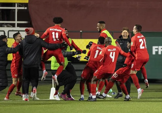 Team Canada celebrates a goal against Costa Rica during second half World Cup qualifier soccer action in Edmonton, November 12, 2021. (The Canadian Press/Jason Franson)