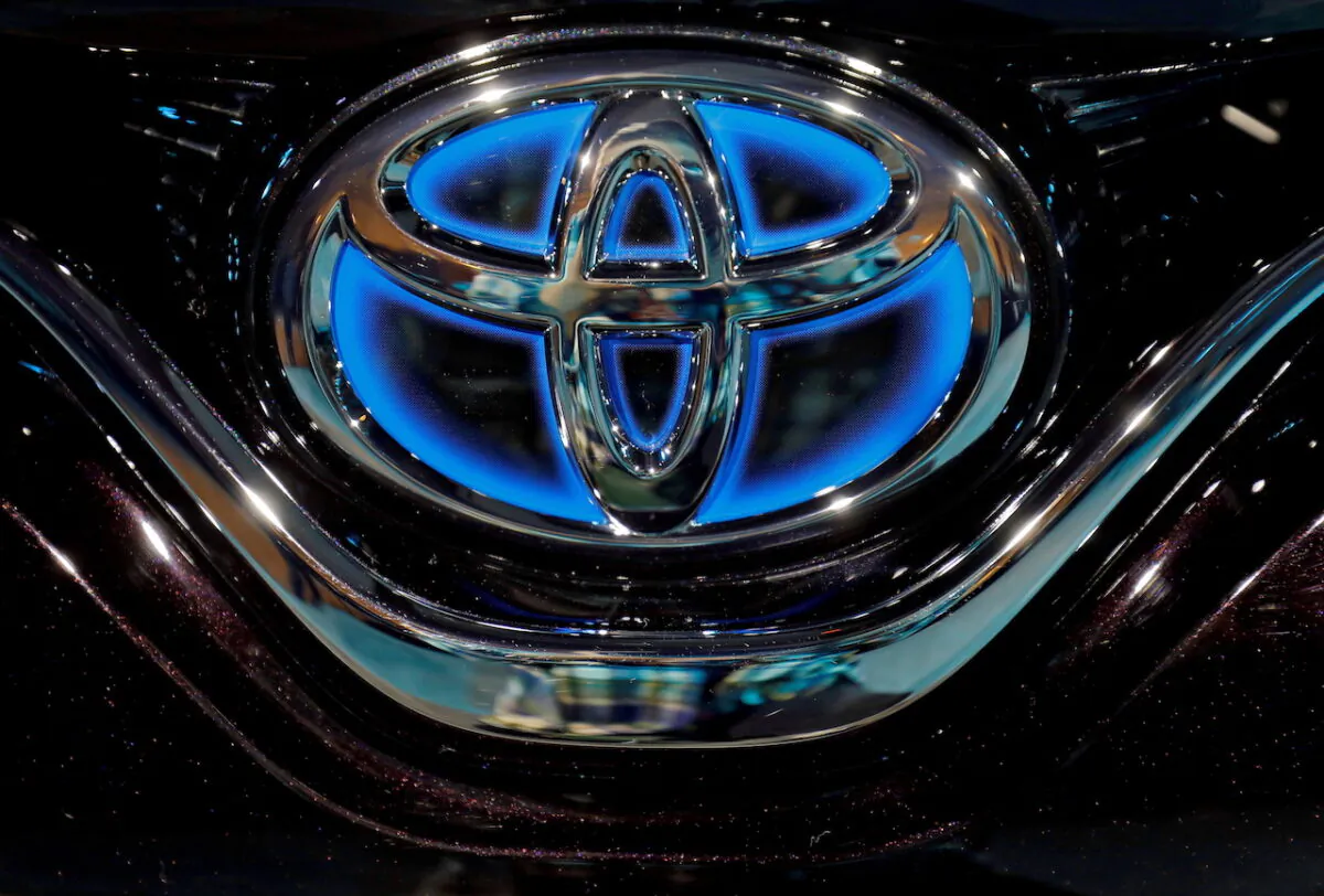 A file photo of the Toyota logo is seen on the bonnet of a newly launched Camry Hybrid electric vehicle at a hotel in New Delhi, India, January 18, 2019. (Anushree Fadnavis/Reuters)