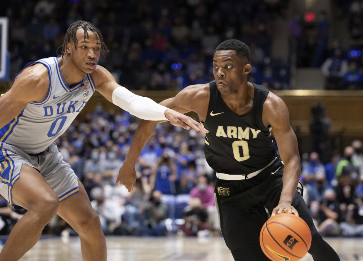 Army's Josh Caldwell right drives against Duke's Wendell Moore Jr. during the first half of an NCAA college basketball game in Durham, N.C., on Nov. 12, 2021. (Ben McKeown/AP Photo)