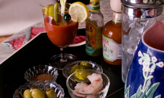 Set up a bloody mary bar for your guests with pitchers of pre-seasoned tomato juice, vodka, and bowls of garnishes. (Victoria de la Maza)