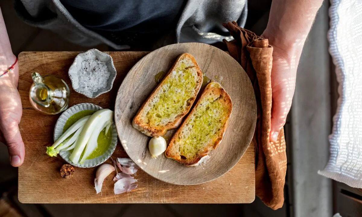 Tuscans know that the best ways to enjoy olio nuovo are some of the simplest: doused on a toasted, garlic-rubbed slice of bread, or used to dip crisp winter vegetables. (Giulia Scarpaleggia)