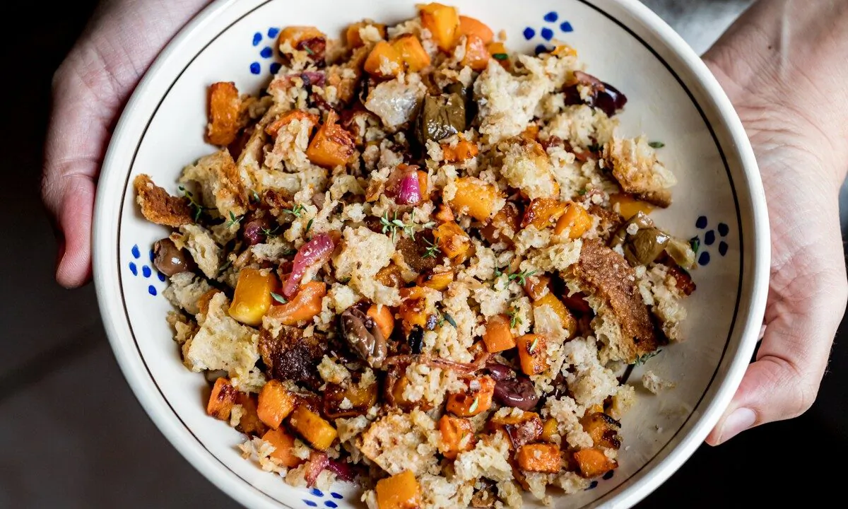 A classic summer salad gets an autumnal makeover with butternut squash, carrots, and meaty olives. (Giulia Scarpaleggia)