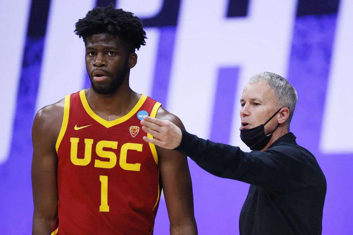 Chevez Goodwin #1 of the USC Trojans stands with head coach Andy Enfield in a file photo. (Jamie Squire/Getty Images)