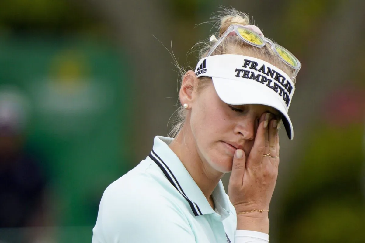 Jessica Korda reacts after missing her put on the 18th hole. Korda finished three under 62, during the LPGA Pelican Women's Championship, Day One, Round One at the Pelican Golf Club in Belleair, Fla. on Nov. 11, 2021. (Martha Asencio-Rhine/Tampa Bay Times via AP)
