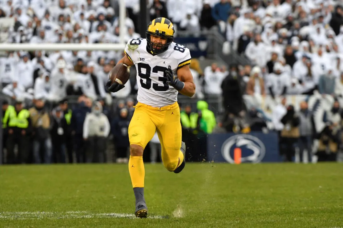 Michigan tight end Erick All (83) sprints to the end zone to score on a 47-yard touchdown pass in the fourth quarter against Penn State during an NCAA college football game in State College, Pa., on Nov. 13, 2021. (Barry Reeger/AP Photo)