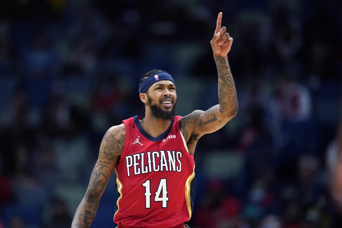 New Orleans Pelicans forward Brandon Ingram gestures, in the first half of an NBA basketball game against the Memphis Grizzlies, in New Orleans, on Nov. 13, 2021. (Gerald Herbert/AP Photo)