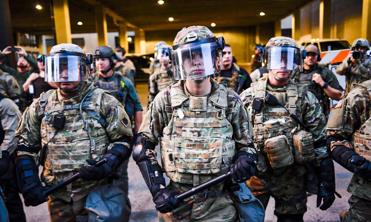 National Guard stand ready in Tulsa, Okla., where President Donald Trump holds a reelection campaign rally at the BOK Center on June 20, 2020. (Brendan Smialowski/AFP via Getty Images)