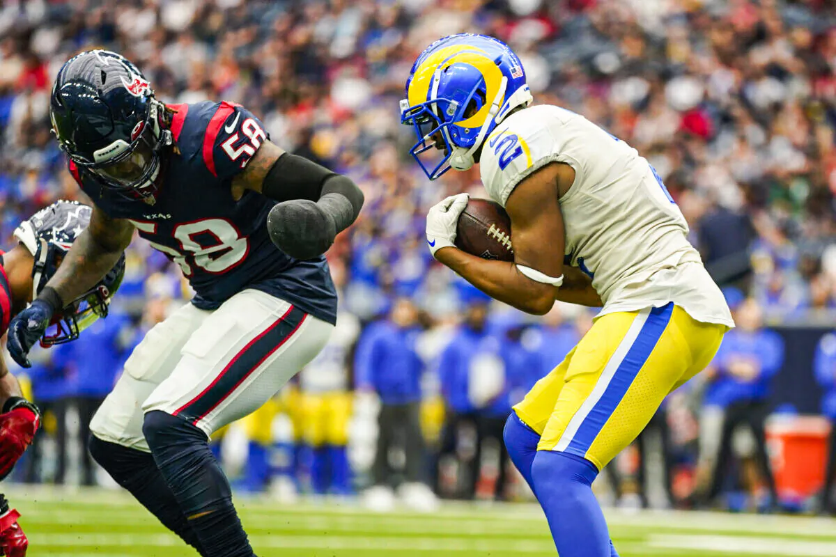 Los Angeles Rams wide receiver Robert Woods (2) catches a pass in front of Houston Texans middle linebacker Christian Kirksey (58) for a touchdown during the first half of an NFL football game, Sunday, Oct. 31, 2021, in Houston. (AP Photo/Eric Christian Smith)
