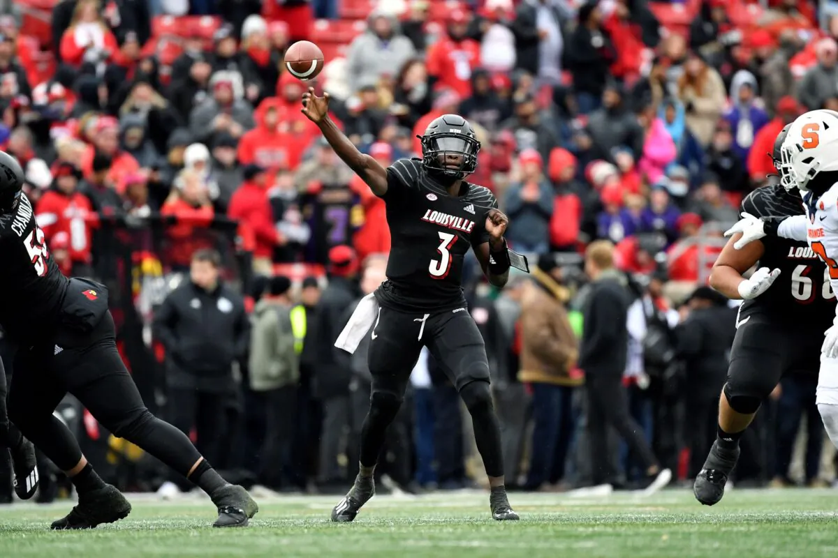 Louisville quarterback Malik Cunningham (3) attempts a pass during the second half of an NCAA college football game against Syracuse in Louisville, Ky., on Nov. 13, 2021. (Timothy D. Easley/AP Photo)