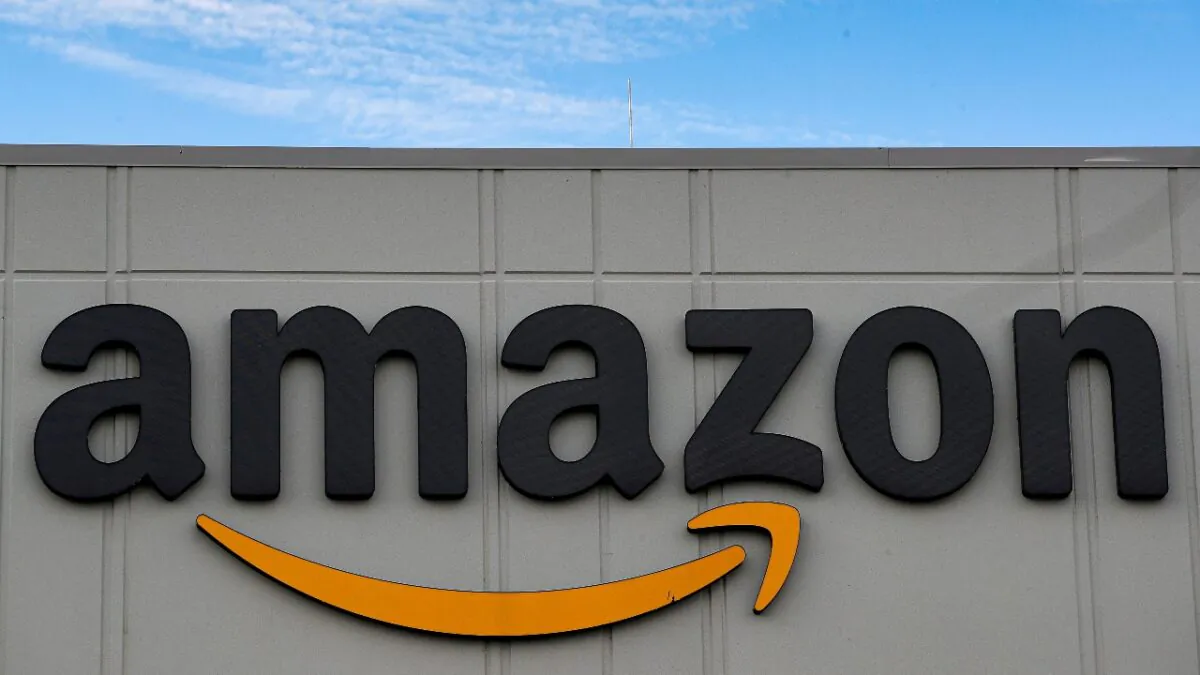The Amazon logo is seen outside its JFK8 distribution center in Staten Island, N.Y., on Nov. 25, 2020. (Brendan McDermid/Reuters)