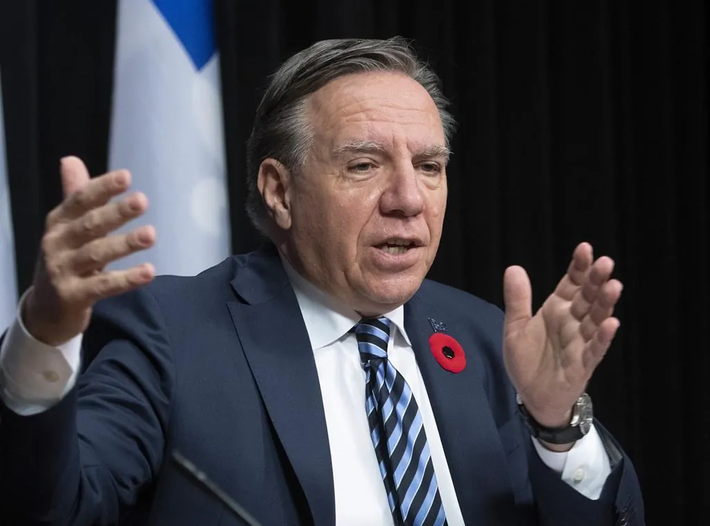 Quebec Premier François Legault responds to reporters' questions at a news conference on Nov. 9 at the legislature in Quebec City. (The Canadian Press/Jacques Boissinot)