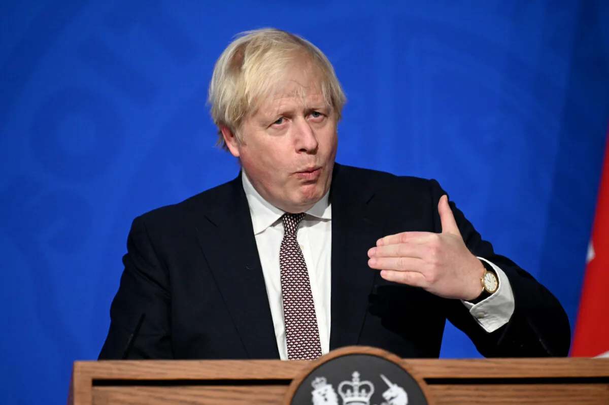 Prime Minister Boris Johnson addresses the media regarding the United Kingdom's COVID-19 infection rate and vaccination campaign at Downing Street Briefing Room in London, on Nov. 15, 2021. (Leon Neal - WPA Pool/Getty Images)