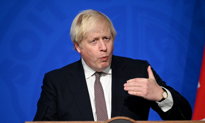 Prime Minister Boris Johnson addresses the media regarding the United Kingdom's COVID-19 infection rate and vaccination campaign at Downing Street Briefing Room in London, on Nov. 15, 2021. (Leon Neal - WPA Pool/Getty Images)