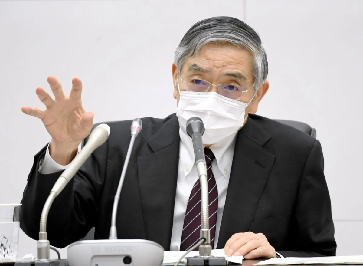 Bank of Japan Governor Haruhiko Kuroda wearing a protective face mask attends a news conference as the spread of the coronavirus disease continues in Tokyo, Japan on April 27, 2020. (Kyodo/via Reuters)