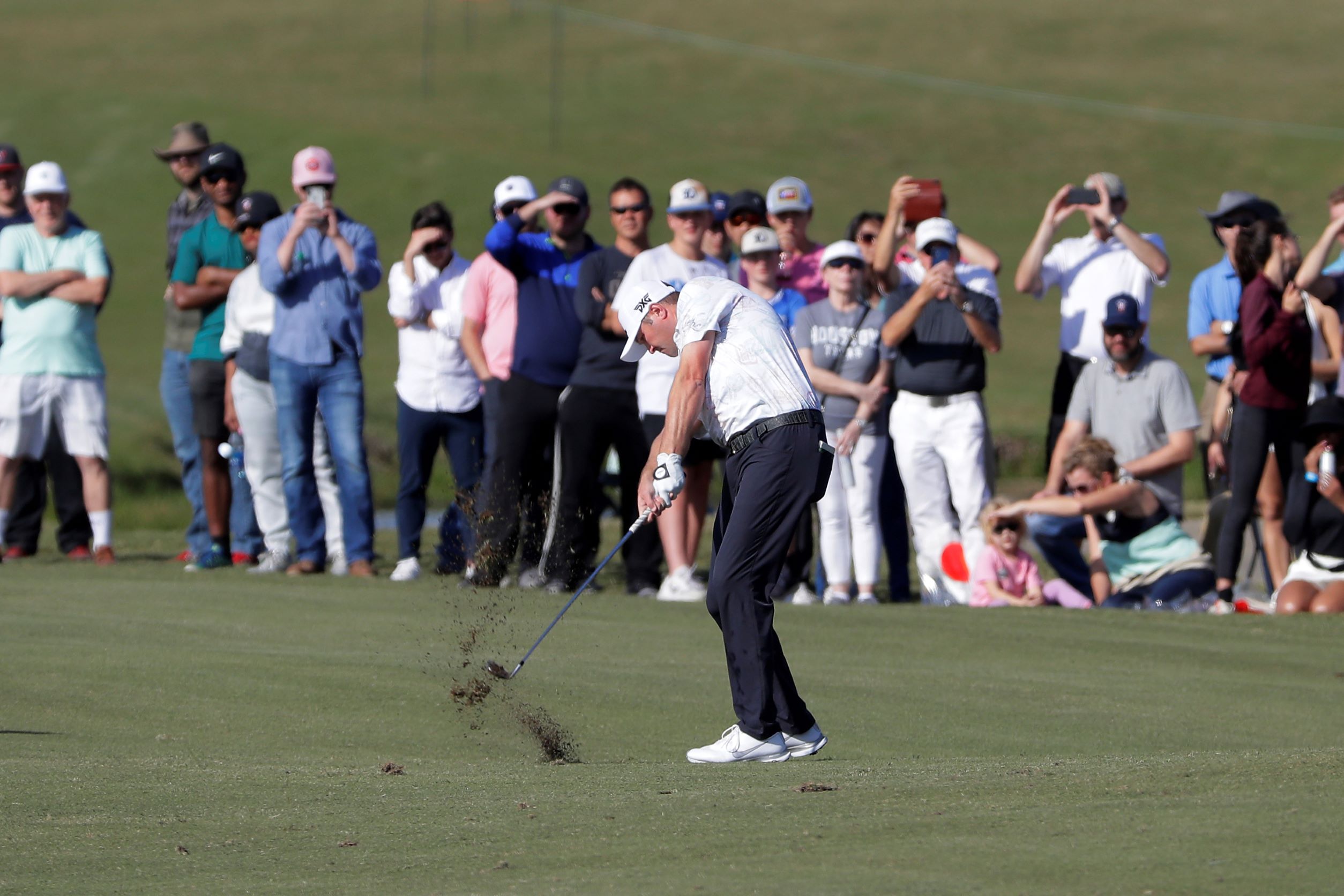 Jason Kokrak hits on the 17th fairway