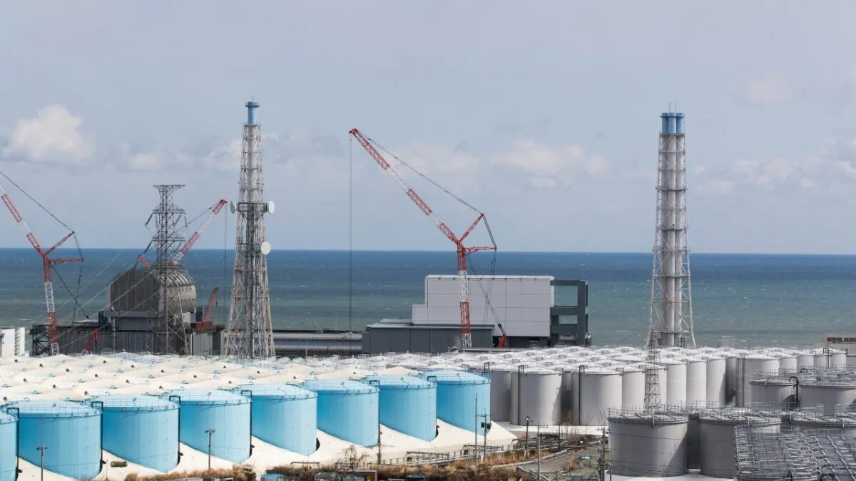 The Pacific Ocean looks over nuclear reactor units of No. 3 (L) and 4 at the Fukushima Daiichi nuclear power plant in Okuma town, Fukushima prefecture, Japan, on Feb. 27, 2021. (Hiro Komae/AP Photo)