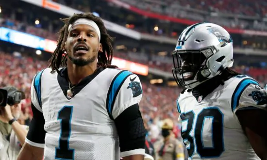 Superman’s Sequel: Newton Leads Panthers Over Cards 34–10