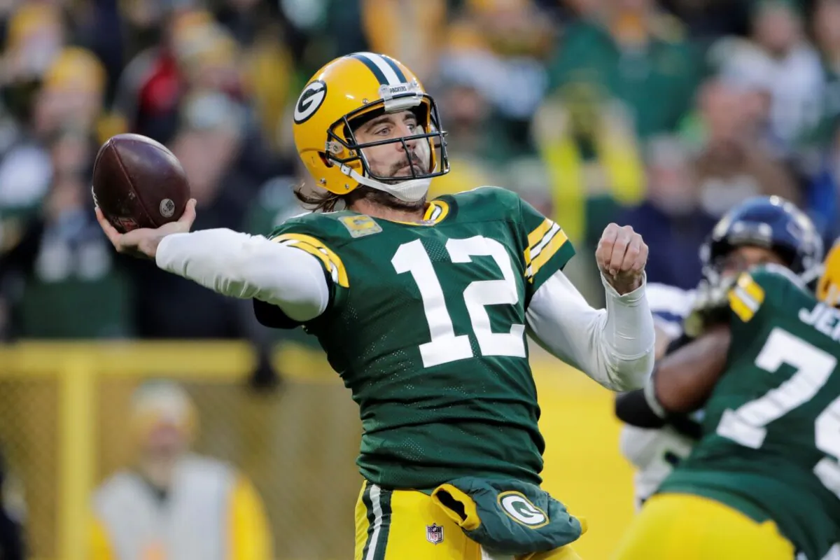 Green Bay Packers' Aaron Rodgers throws during the first half of an NFL football game against the Seattle Seahawks on Nov. 14, 2021, in Green Bay, Wis. (Aaron Gash/AP Photo)