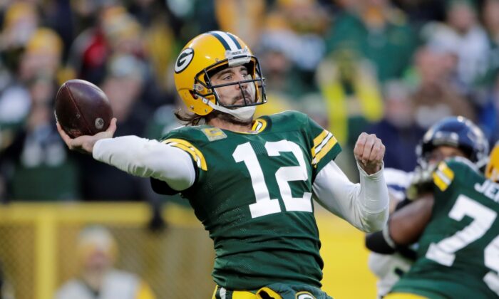 Green Bay Packers' Aaron Rodgers throws during the first half of an NFL football game against the Seattle Seahawks on Nov. 14, 2021, in Green Bay, Wis. (Aaron Gash/AP Photo)

