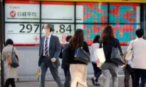 Asian Shares Higher as Japan Says Economy Shrank in Third Quarter