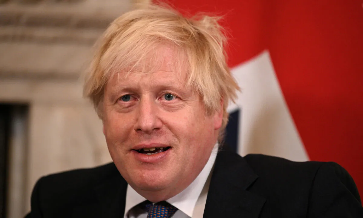Prime Minister Boris Johnson speaks during his meeting with Greece's Prime Minister Kyriakos Mitsotakis (not pictured) at 10 Downing Street, London on Nov. 16, 2021. (Daniel Leal/PA)
