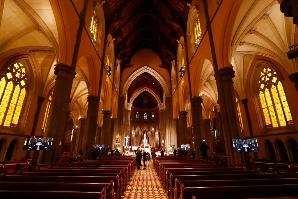 A man is seen praying outside St. Mary's Cathedral in Sydney, Australia, on Oct. 23, 2020. (Lisa Maree Williams/Getty Images)