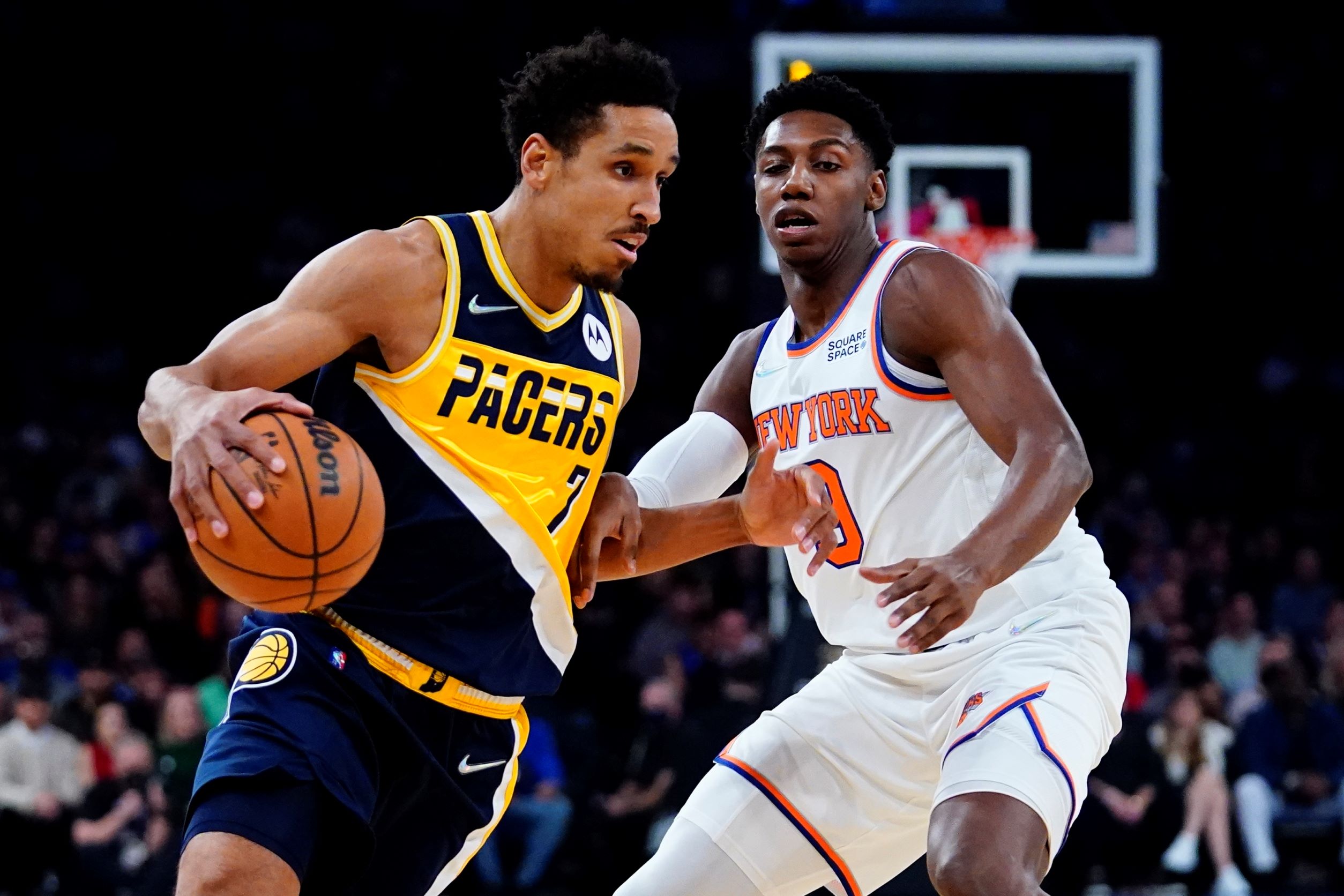 Indiana Pacers' Malcolm Brogdon (7) drives past New York Knicks' RJ Barrett