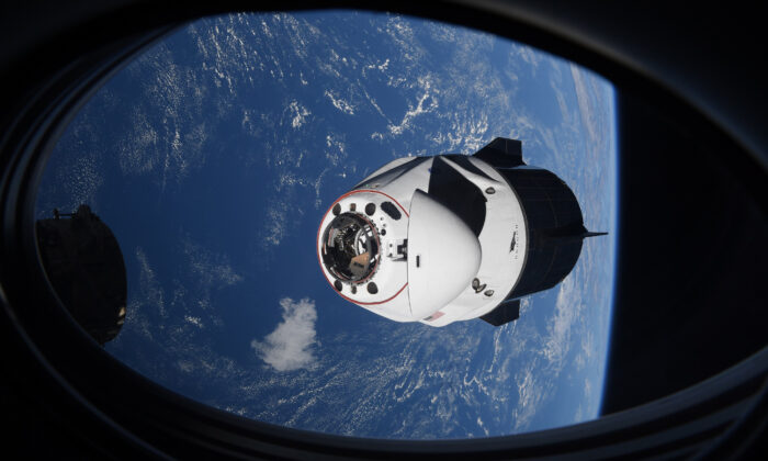  SpaceX Crew Dragon capsule approaches the International Space Station for docking, on April 24, 2021. (NASA via AP)