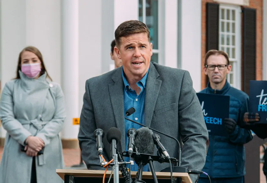 Tanner Cross, a physical education teacher at Leesburg Elementary School, speaks outside the Loudoun County Circuit Court on Nov. 15, 2021, after reaching a settlement with the Loudoun County School Board allowing for his permanent reinstatement. (Courtesy of Alliance Defending Freedom)