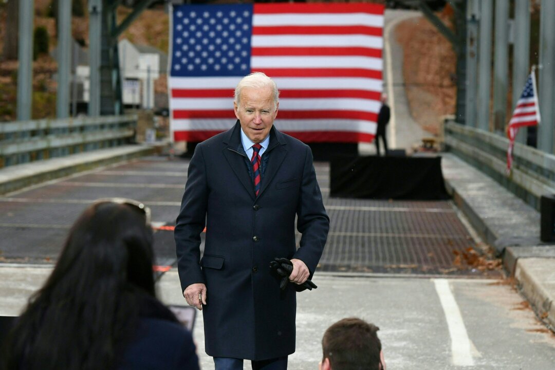 President Joe Biden greets guests after speaking on infrastructure at the NH 175 bridge over the Pemigewasset River in Woodstock, N.H., on Nov. 16, 2021. (Mandel Ngan/AFP via Getty Images)
