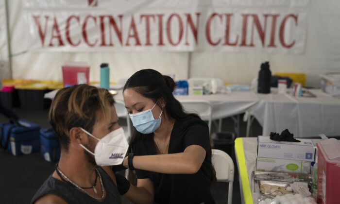 A nurse administers a COVID-19 vaccine in Orange, Calif., on Aug. 28, 2021. (Jae C. Hong/AP Photo)