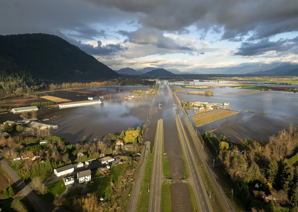 Floodwaters cover Highway 1 in Abbotsford, British Columbia, on Nov. 16, 2021. (Jonathan Hayward/The Canadian Press via AP)