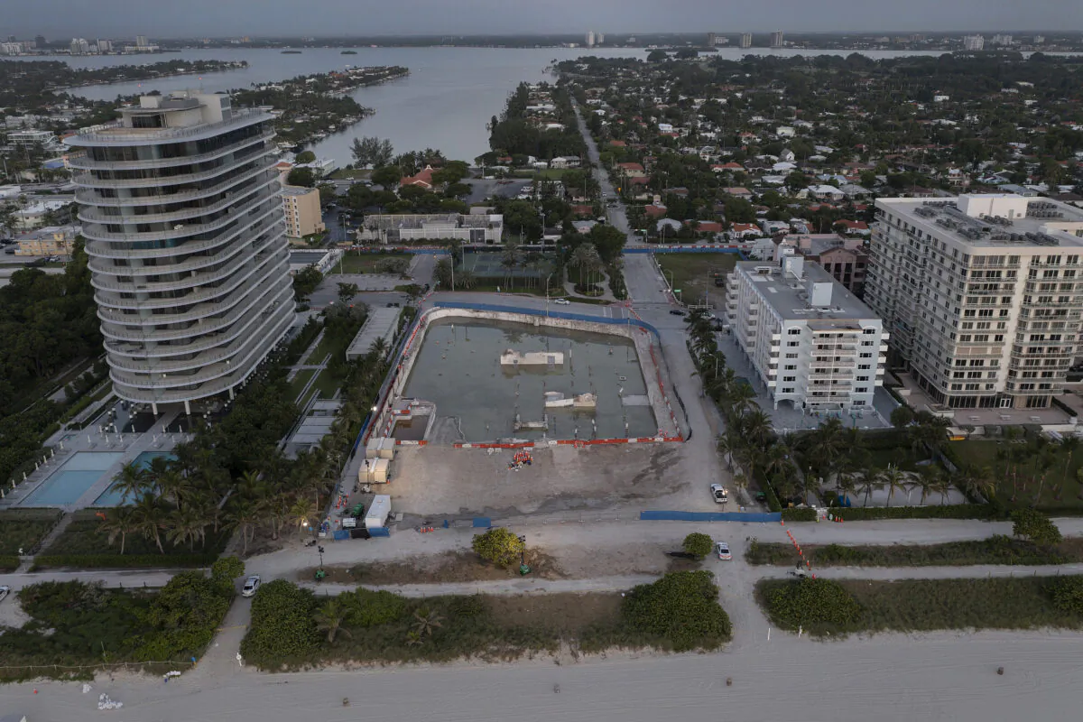 In this aerial view, the cleared lot that was where the collapsed 12-story Champlain Towers South condo building once stood in Surfside, Fla., on July 31, 2021. (Joe Raedle/Getty Images)