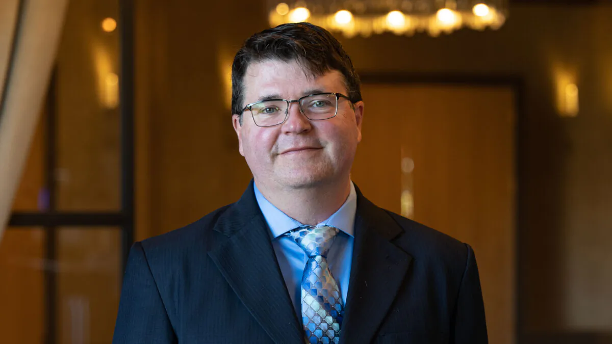 Dr. Steven Templeton, an Associate Professor of Microbiology and Immunology at the Indiana University School of Medicine, attends the inaugural conference of the Brownstone Institute in Hartford, Conn. on Nov. 13, 2021. (York Du/The Epoch Times)