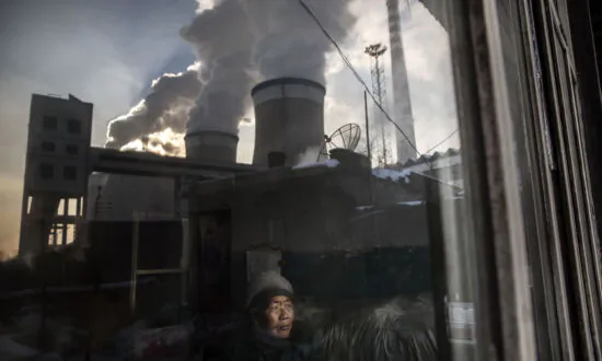 ANALYSIS: Beijing’s Emissions Commitment Being Questioned as Kerry Holds Climate Talks in China