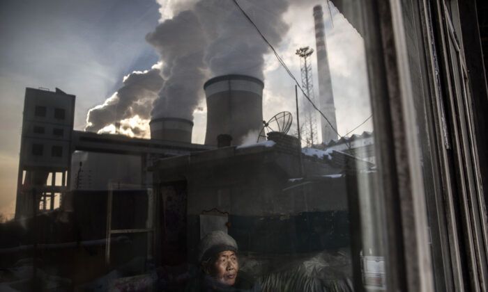 ANALYSIS: Beijing's Emissions Commitment Being Questioned as Kerry Holds Climate Talks in China