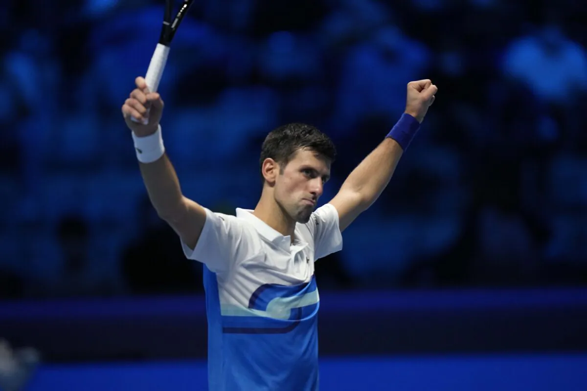 Serbia's Novak Djokovic celebrates after defeating Russia's Andrey Rublev during their ATP World Tour Finals singles tennis match, at the Pala Alpitour in Turin, Italy, on Nov. 17, 2021. (Luca Bruno/AP Photo)