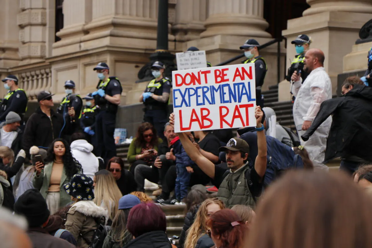 Protesters gathered outside Victoria's parliament house on Nov. 17, 2021. (Rita Li/ Epoch Times)