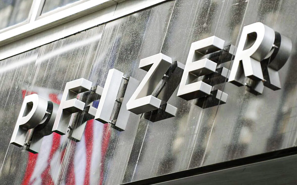 A sign for Pfizer is displayed in New York in a file photograph. (Timothy A. Clary/AFP via Getty Images)