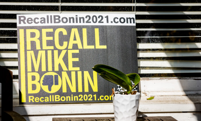 A sign to recall 11th district Los angeles City Councilman Mike Bonin sits in the yard of a home in Venice Beach, Calif., on Nov. 8, 2021. (John Fredricks/The Epoch Times)