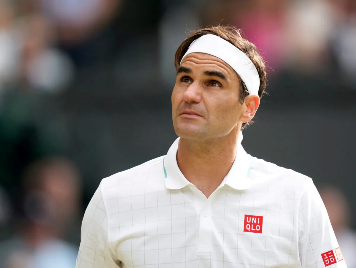 Roger Federer of Switzerland plays against Hubert Hurkacz of Poland in the quarter finals at All England Lawn Tennis and Croquet Club in London on July 7, 2021. (Peter van den Berg/USA TODAY Sports via Reuters)