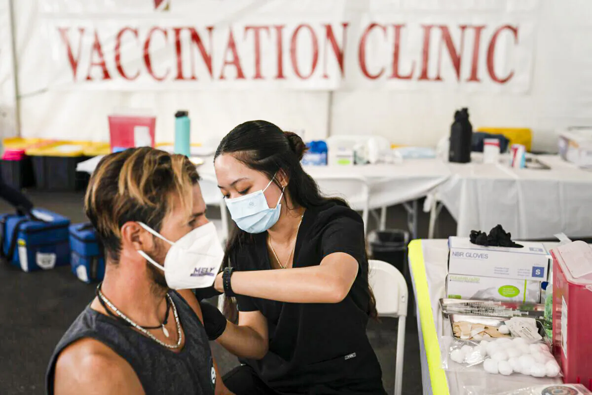 A nurse administers a COVID-19 vaccine in Orange, Calif., on Aug. 28, 2021. (Jae C. Hong/AP Photo)